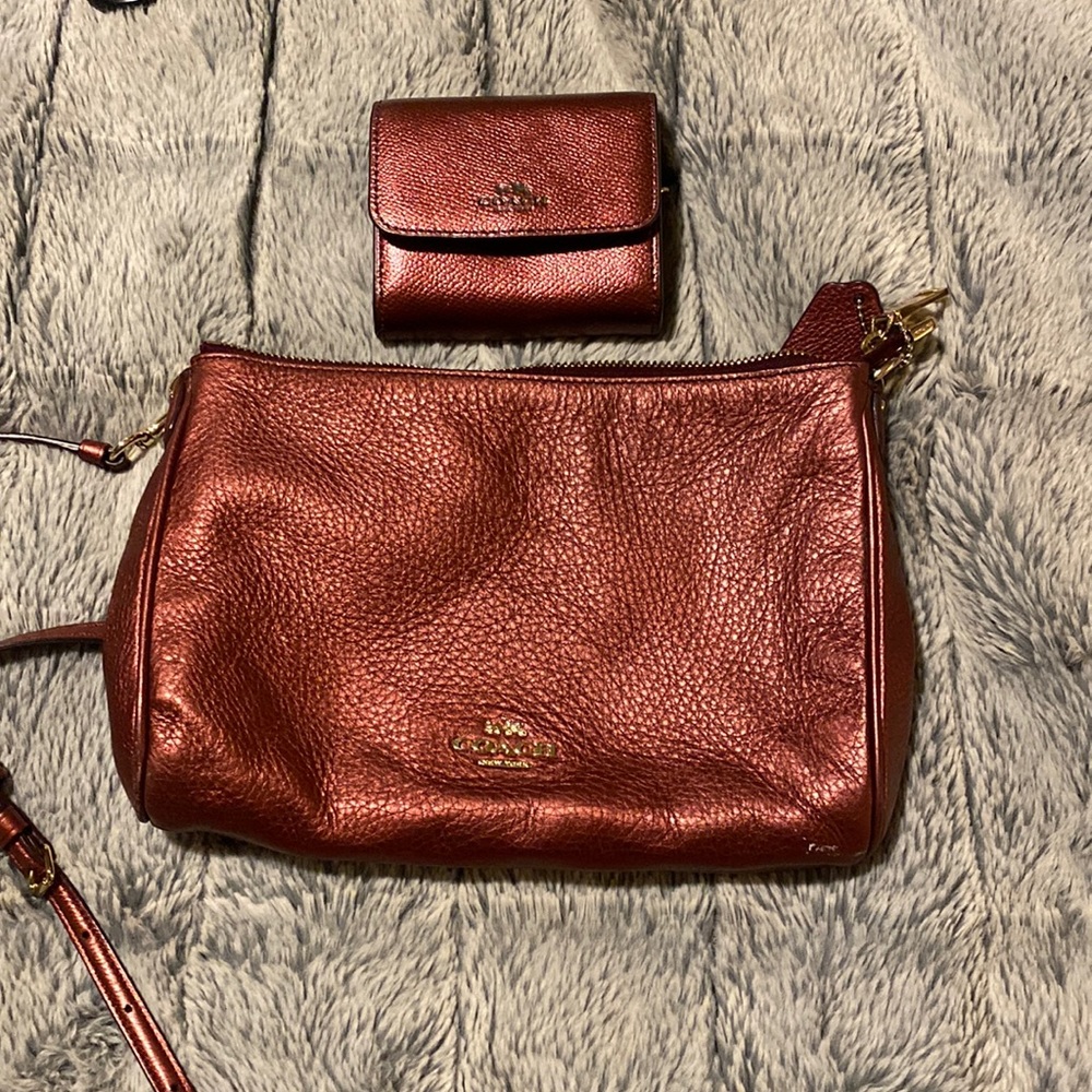 Coach shimmery maroon cross body with matching wallet